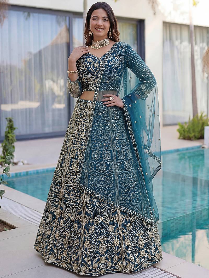 Splendid Teal Blue Sequins Net Party Wear Lehenga With Blouse