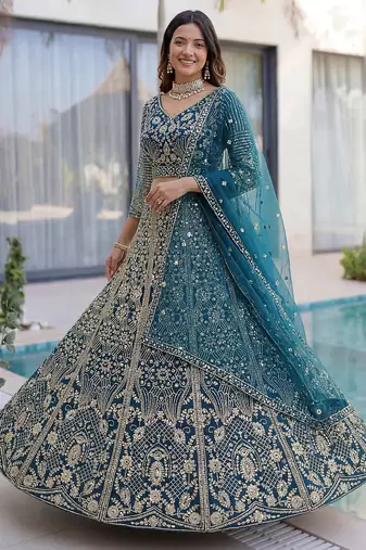 Splendid Teal Blue Sequins Net Party Wear Lehenga With Blouse