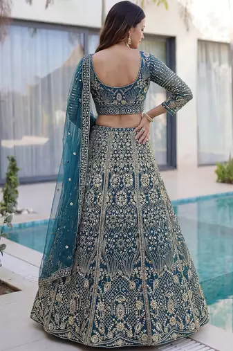 Splendid Teal Blue Sequins Net Party Wear Lehenga With Blouse