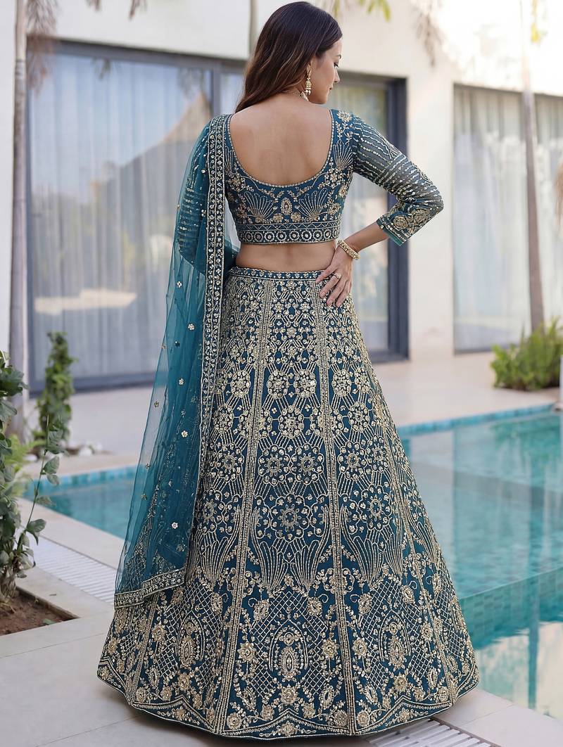 Splendid Teal Blue Sequins Net Party Wear Lehenga With Blouse