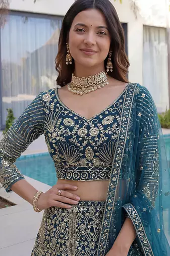 Splendid Teal Blue Sequins Net Party Wear Lehenga With Blouse