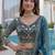 Splendid Teal Blue Sequins Net Party Wear Lehenga With Blouse