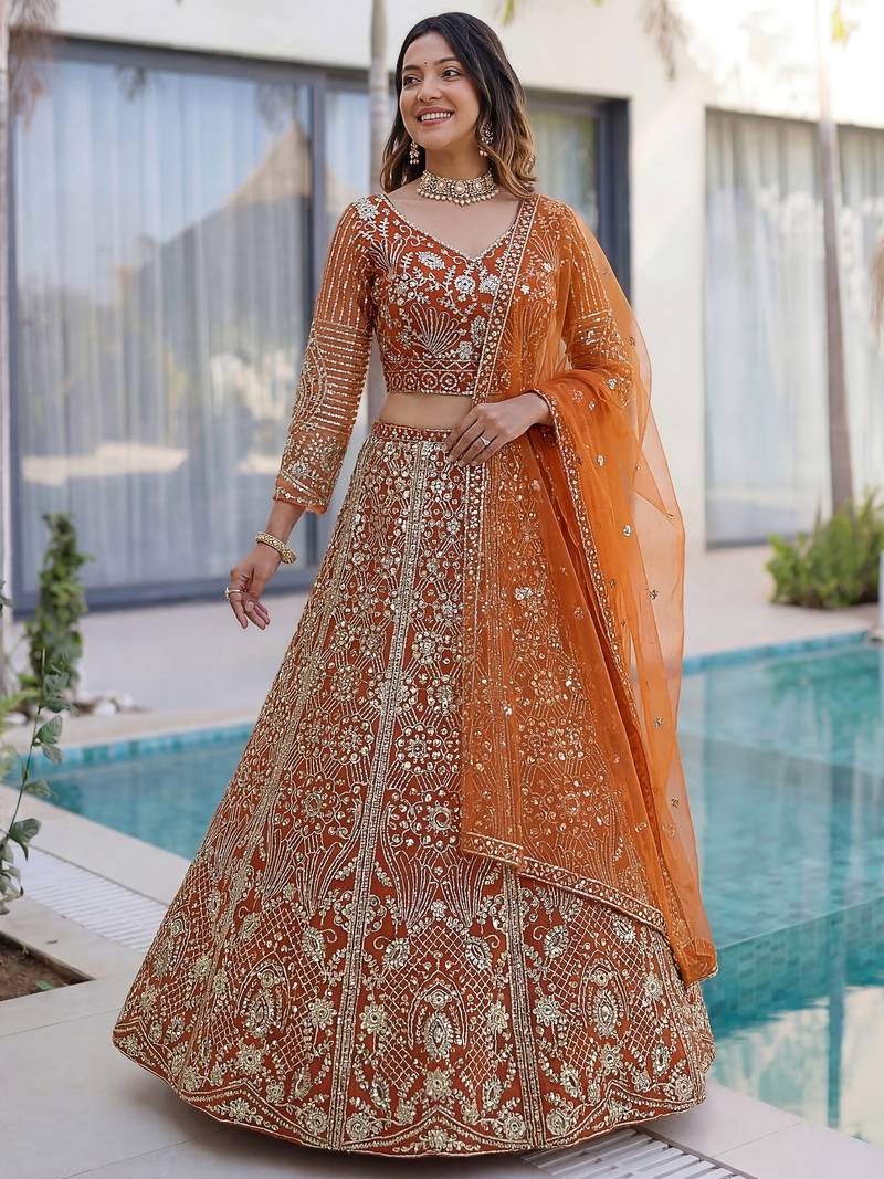 Gorgeous Orange Sequins Net Evening Wear Lehenga Choli With Dupatta