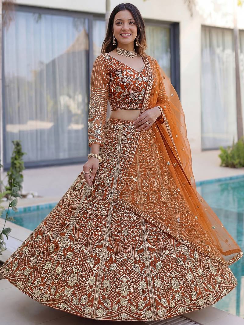Gorgeous Orange Sequins Net Evening Wear Lehenga Choli With Dupatta