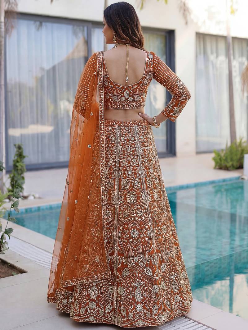 Gorgeous Orange Sequins Net Evening Wear Lehenga Choli With Dupatta