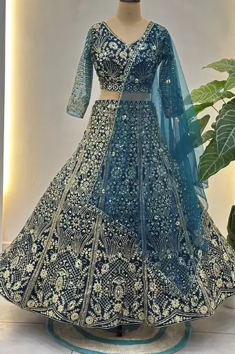Splendid Teal Blue Sequins Net Party Wear Lehenga With Blouse