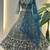 Splendid Teal Blue Sequins Net Party Wear Lehenga With Blouse