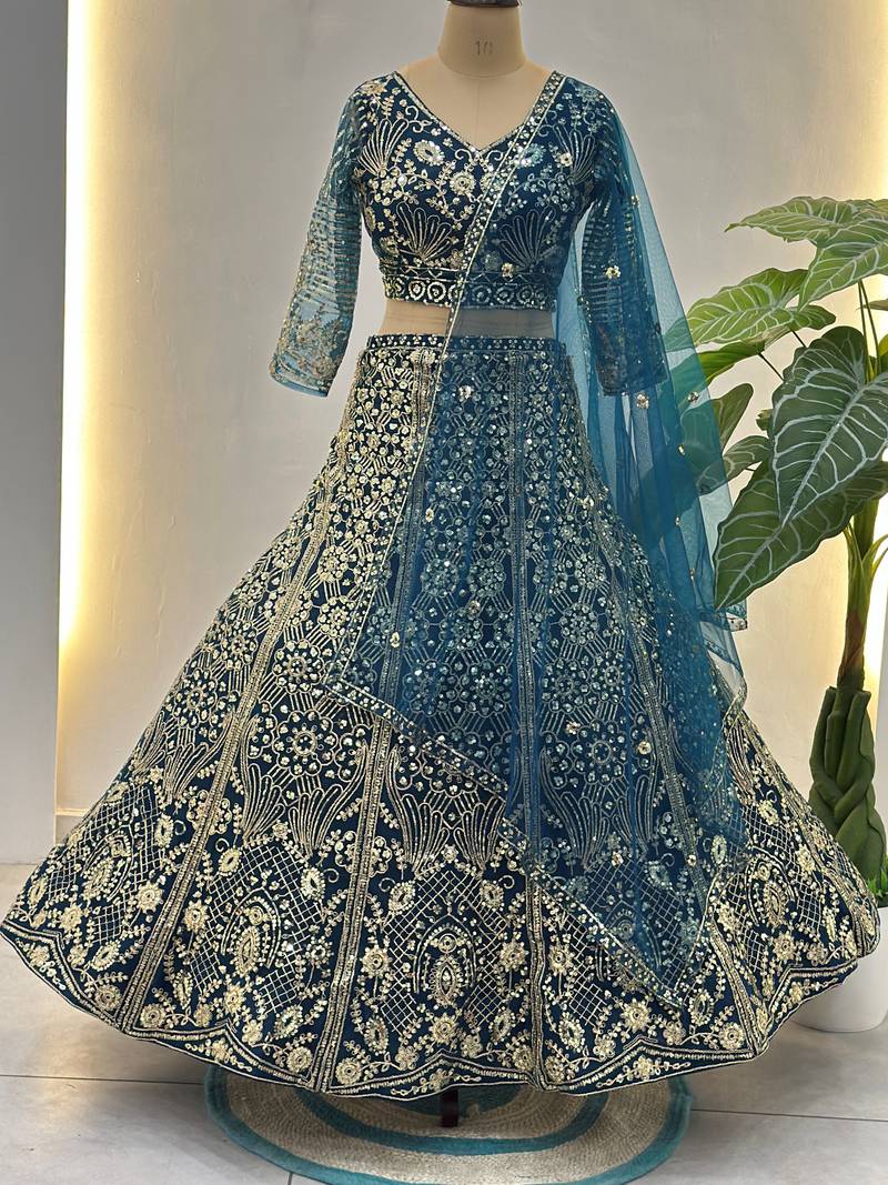 Splendid Teal Blue Sequins Net Party Wear Lehenga With Blouse