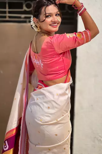 White organza zari weaving saree with matching blouse piece