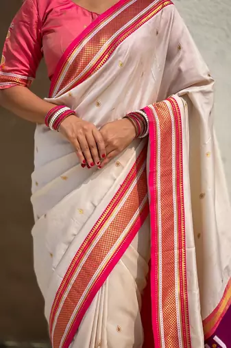 White organza zari weaving saree with matching blouse piece