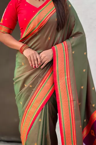 Olive organza zari weaving saree with matching blouse piece