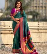 Teal organza zari weaving saree with matching blouse piece