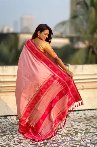 Peach border traditional butti & geometric zari work rich woven pallu design