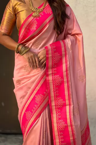 Peach border traditional butti & geometric zari work rich woven pallu design