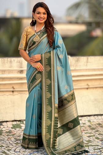 Sky blue border traditional butti & geometric zari work rich woven pallu design