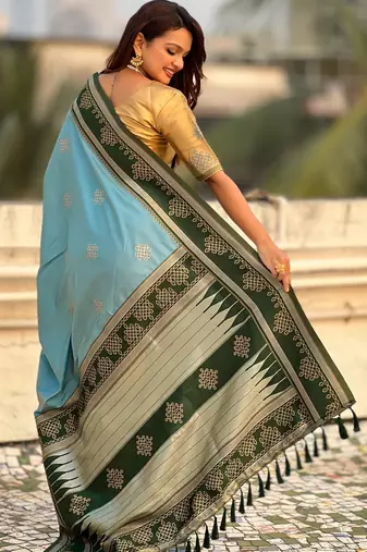 Sky blue border traditional butti & geometric zari work rich woven pallu design