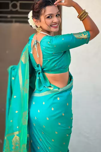Teal silk blend saree with golden zari motifs & rite woven pallu | traditional festive wear saree