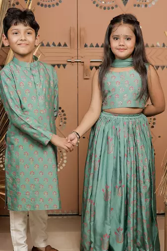 Teal green block printed dola silk lehenga set