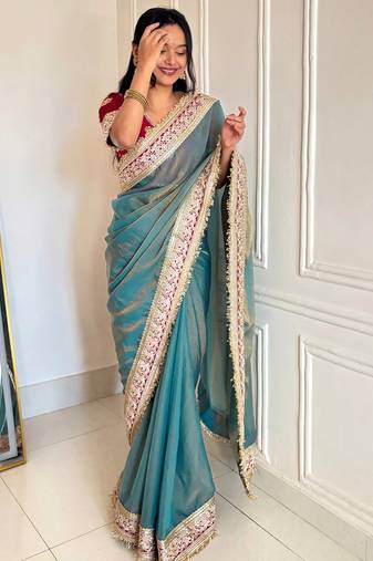 Women's shimmer silk traditional motiff embroidered saree with blouse piece