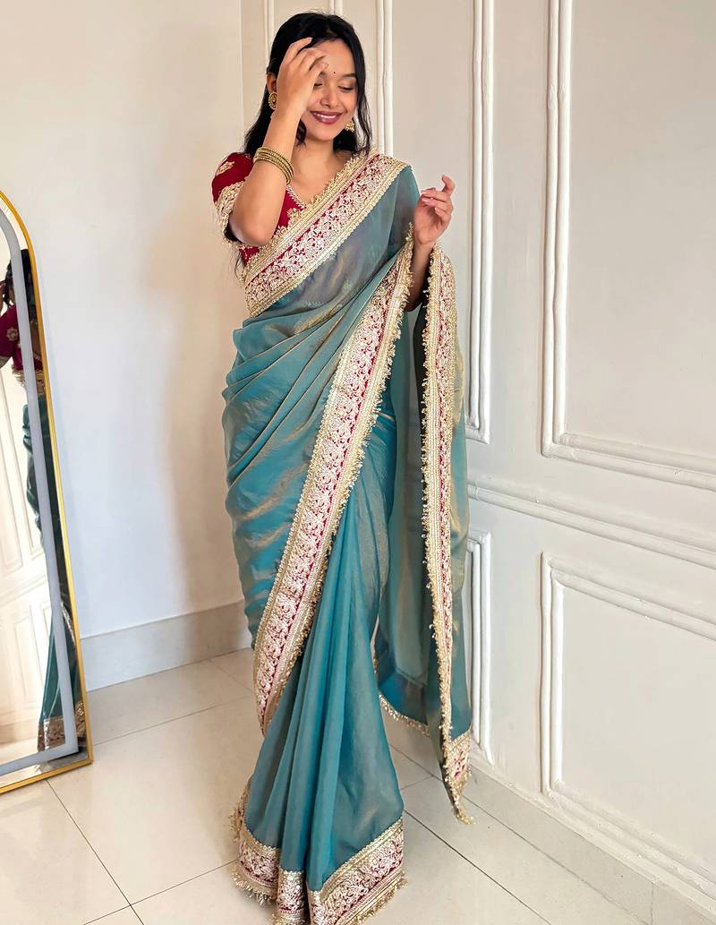 Women's shimmer silk traditional motiff embroidered saree with blouse piece