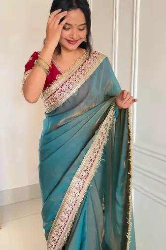 Women's shimmer silk traditional motiff embroidered saree with blouse piece