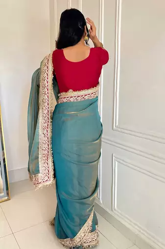 Women's shimmer silk traditional motiff embroidered saree with blouse piece
