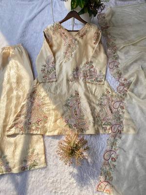 cream embroidered kurta set 1