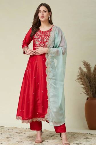 red traditional kurta set