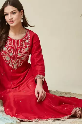 red traditional kurta set