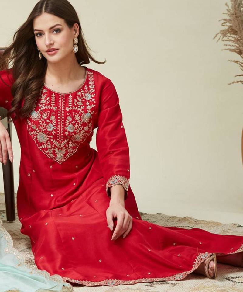 red traditional kurta set