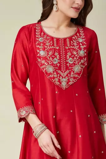 red traditional kurta set