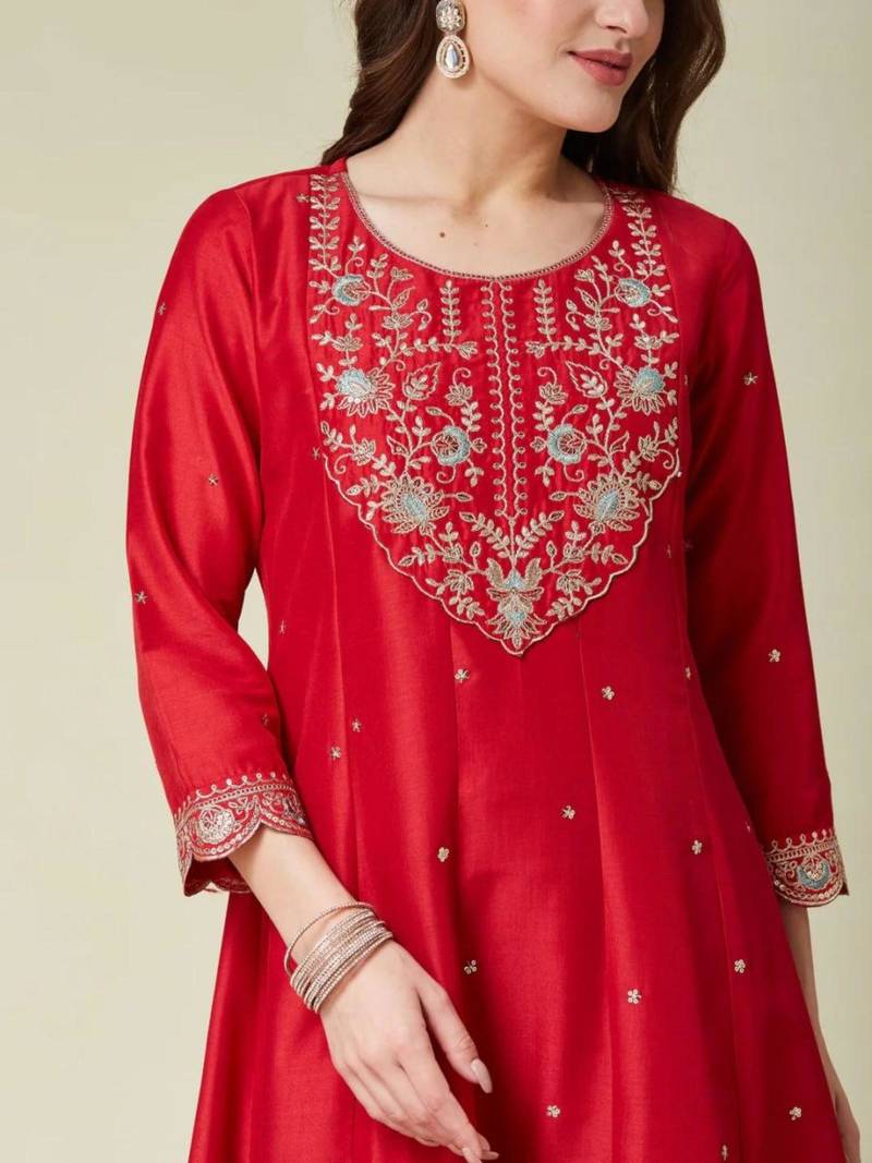 red traditional kurta set