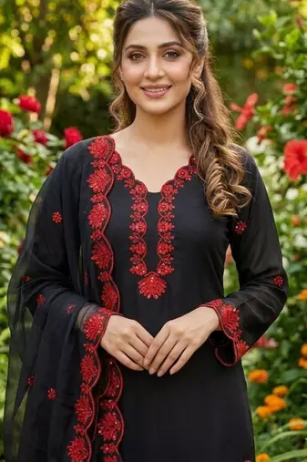 black embroidered kurta set with red detailing