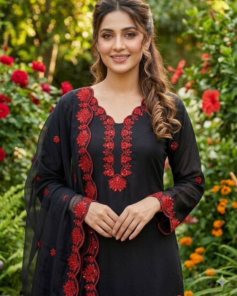black embroidered kurta set with red detailing