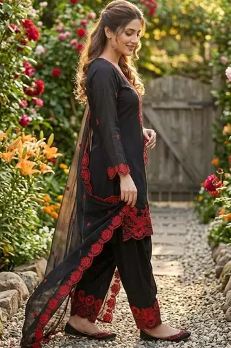 black embroidered kurta set with red detailing