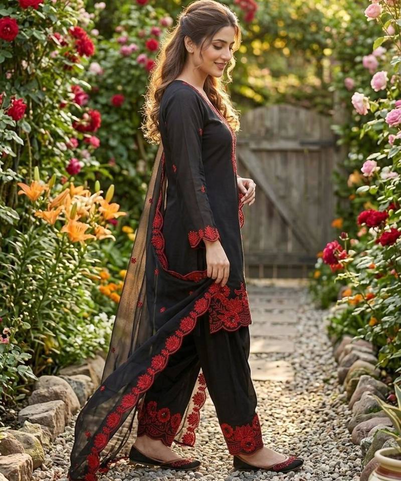black embroidered kurta set with red detailing