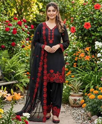 black embroidered kurta set with red detailing 1