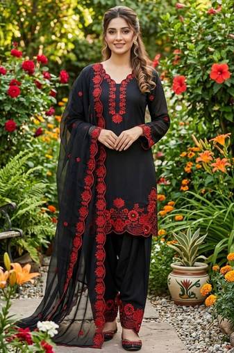black embroidered kurta set with red detailing
