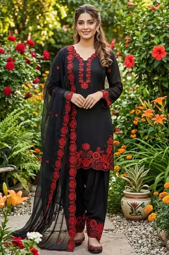 black embroidered kurta set with red detailing