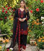 black embroidered kurta set with red detailing