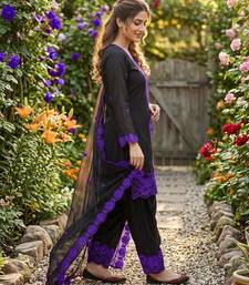 black embroidered kurta set with purple detailing