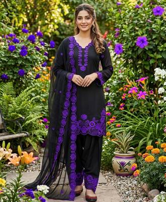 black embroidered kurta set with purple detailing 1