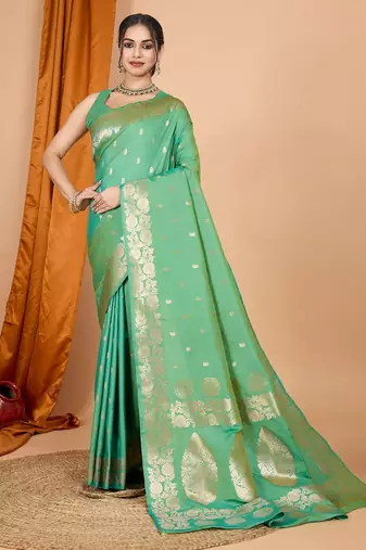Green woven self design embellished pure silk banarasi saree with blouse