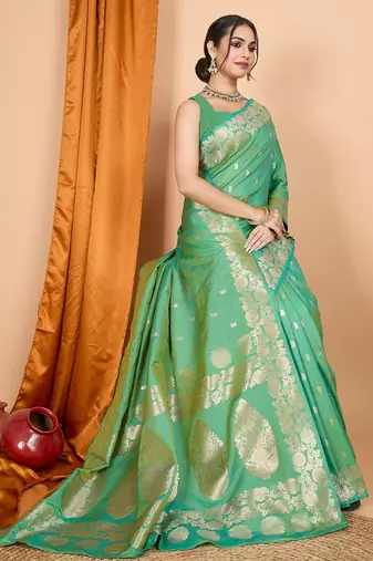 Green woven self design embellished pure silk banarasi saree with blouse