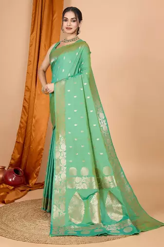 Green woven self design embellished pure silk banarasi saree with blouse