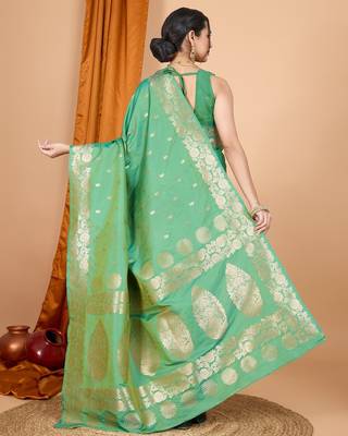 Green woven self design embellished silk blend banarasi saree with blouse 4
