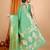 Green woven self design embellished pure silk banarasi saree with blouse