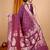 Wine woven self design embellished pure silk banarasi saree with blouse