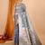Grey woven self design embellished pure silk banarasi saree with blouse