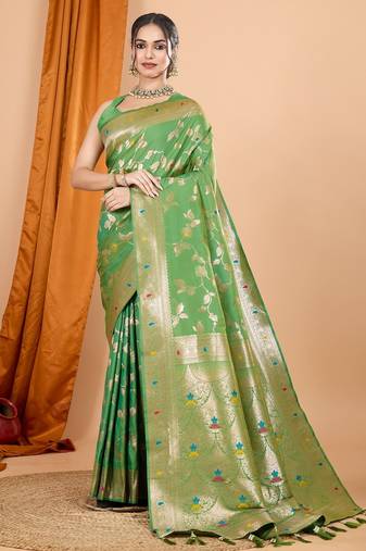 Light green woven self design embellished pure silk banarasi saree with blouse